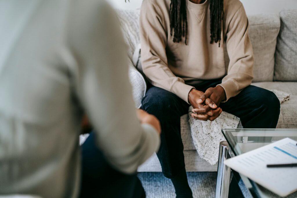 Photo of a patient in conversation with their psychiatrist
